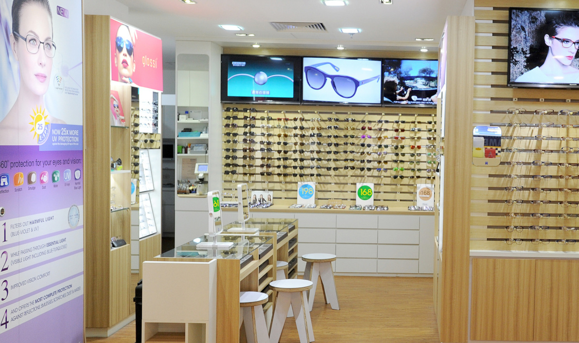 optical shop interior design by ada builders pte ltd